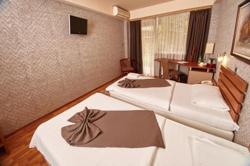莱昂纳多酒店 客房内的一张或多张床位