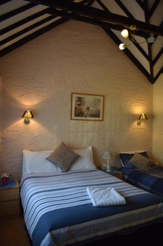 盖特威克城堡住宿加早餐旅馆客房内的一张或多张床位
