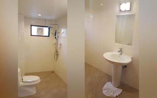 卡伦海滩Oasis Apartments & Bar的一间带卫生间和水槽的浴室