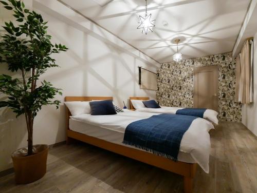 Sakura Coco Residence客房内的一张或多张床位
