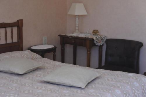 梅内斯-霍姆住宿加早餐旅馆客房内的一张或多张床位