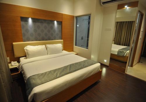 普纳塔拉瓦德克拉克酒店客房内的一张或多张床位