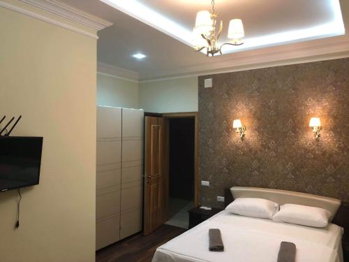 Guest House Kobuleti on Aghmashenebeli客房内的一张或多张床位