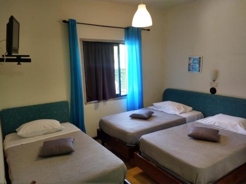 Residencial Montanhês客房内的一张或多张床位