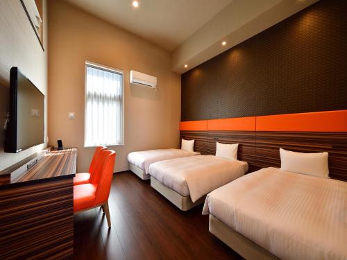 WBF博多大酒店客房内的一张或多张床位