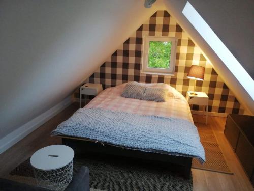 Dom na Kaszubach客房内的一张或多张床位