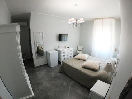 Residence Arcobaleno客房内的一张或多张床位