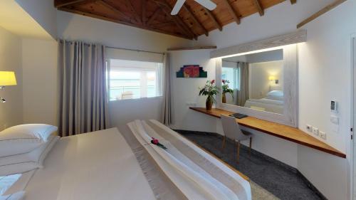 昂迪尼斯海滩酒店客房内的一张或多张床位