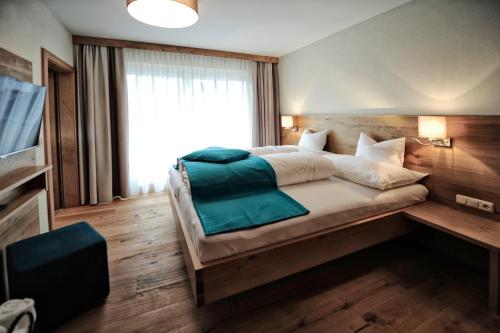 多尔夫斯塔多酒店客房内的一张或多张床位