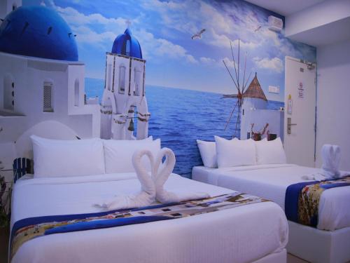 马六甲Santorini Hotel Melaka的海景客房 - 带两张床