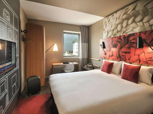 卡萨宜必思旅行者酒店客房内的一张或多张床位