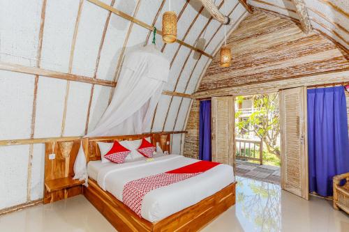 吉利阿尔Biba Beach Village的卧室配有一张床