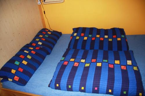 Penzion W客房内的一张或多张床位