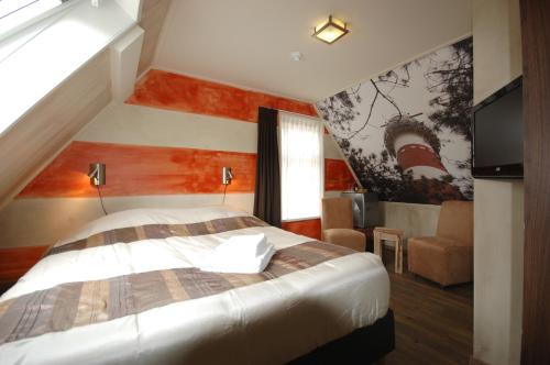 阿默兰岛比吉恒酒店客房内的一张或多张床位