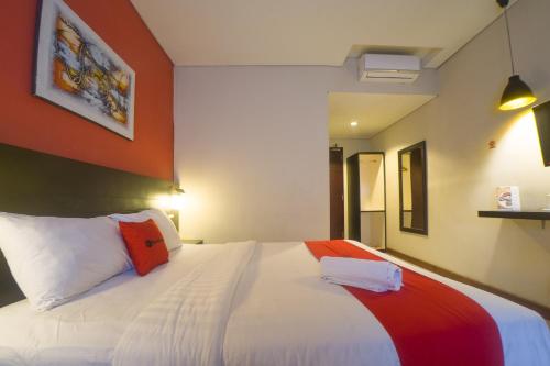 Budget Hotel Ambon客房内的一张或多张床位