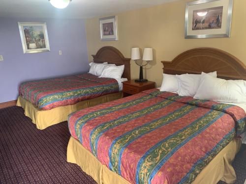 Mt. Vernon Motel客房内的一张或多张床位