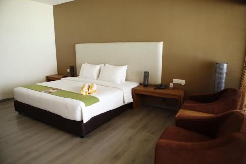 Eriyadu Island Resort客房内的一张或多张床位
