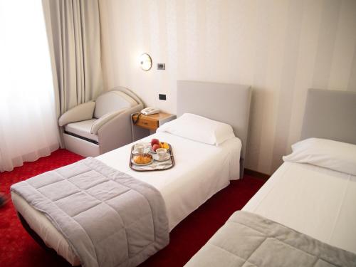 特萨林酒店客房内的一张或多张床位