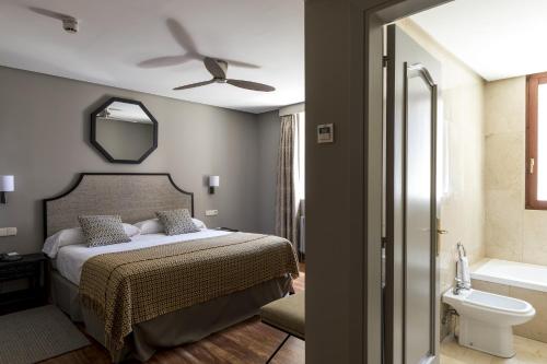 宏达瑞比亚旅馆客房内的一张或多张床位