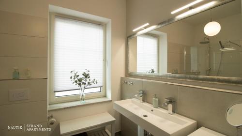 NAUTIK STRANDAPARTMENTS Luxuswohnung Atlantik的一间浴室