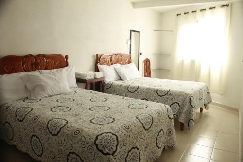 Hotel Posada Sernichari客房内的一张或多张床位