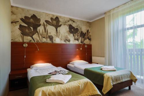 司伦伊奥格罗德旅馆客房内的一张或多张床位