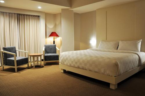Beverly Hotel Batam客房内的一张或多张床位
