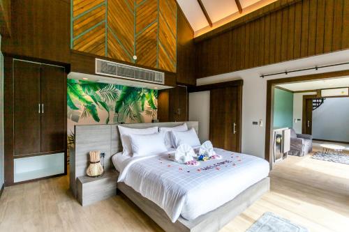 ChaoKoh Phi Phi Hotel and Resort- SHA Extra Plus客房内的一张或多张床位