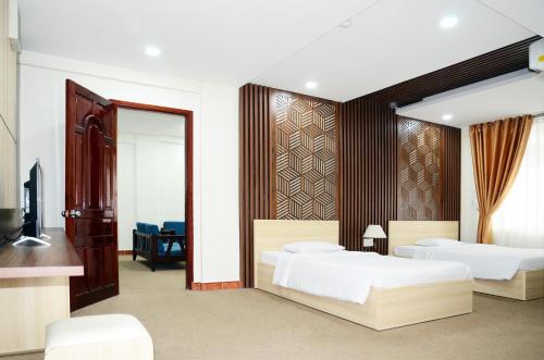 Khách sạn Đồng Nai客房内的一张或多张床位