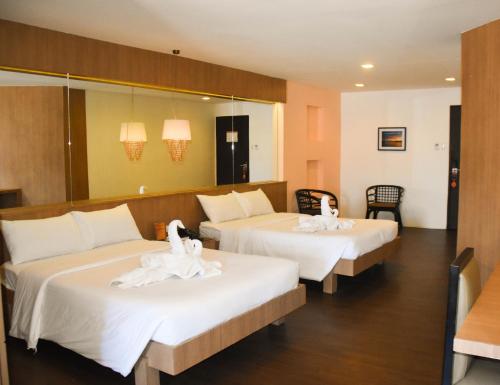 塔克罗班广场酒店客房内的一张或多张床位