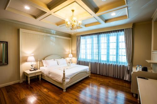 Merchant Villa- SHA Extra Plus客房内的一张或多张床位
