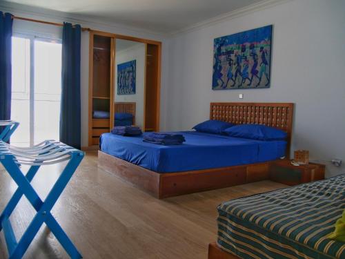 Suite Mariposa Sospesa Sul Mare客房内的一张或多张床位