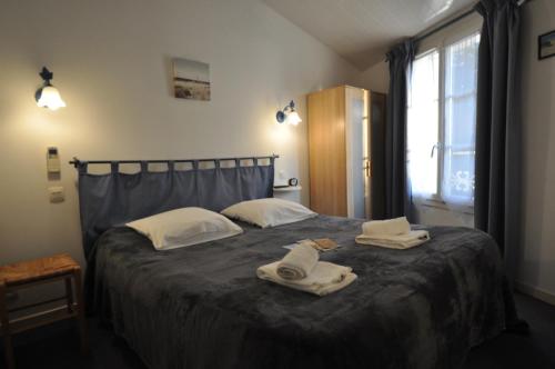 Le Concept Hotel客房内的一张或多张床位