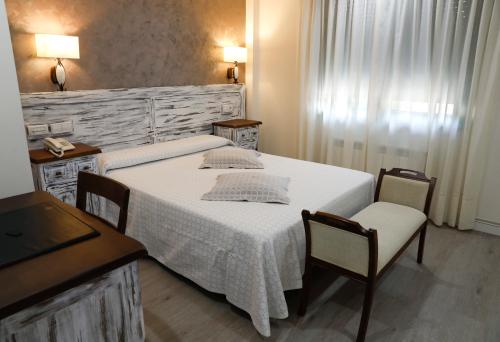 奥普鲁索旅馆客房内的一张或多张床位