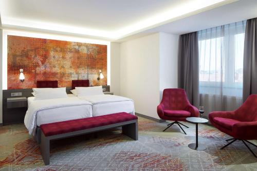 阿罗萨贝斯特韦斯特尊贵酒店客房内的一张或多张床位