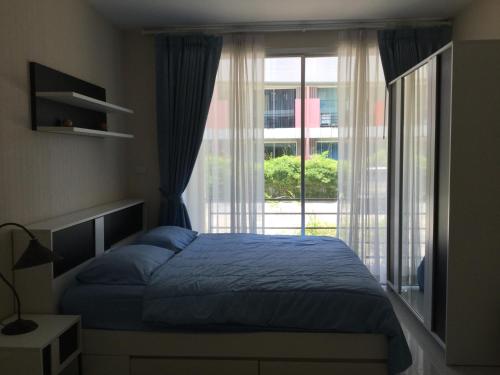 Best Point Condominium Cape Panwa客房内的一张或多张床位