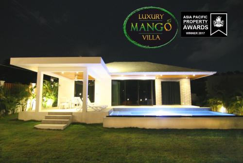 波普托-20 Off per cent Luxury Mango Villa的夜间别墅,拥有新项目保镖保镖标志