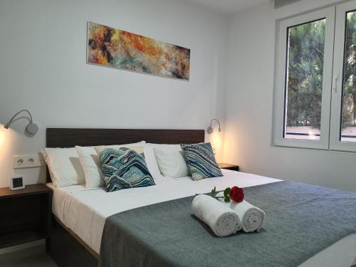 ecoSmart Apartments Granada客房内的一张或多张床位