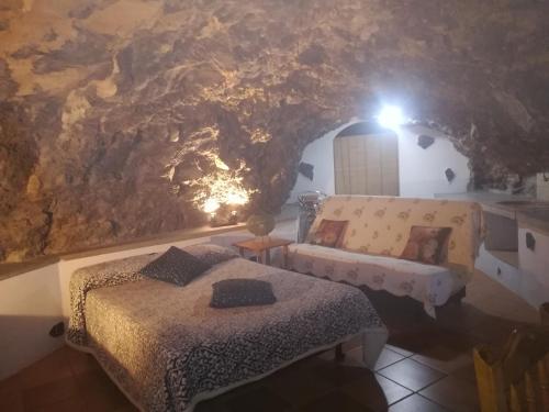 Casa cueva El perucho客房内的一张或多张床位