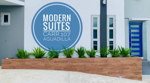 阿瓜迪亚Modern Suite #0 - best location的现代套房汽车经销商标志