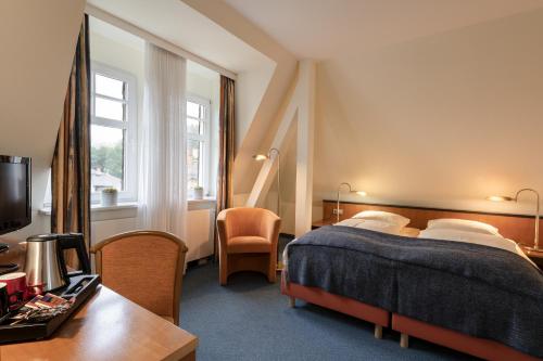 诺伊施塔特霍夫酒店客房内的一张或多张床位