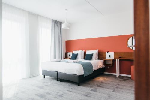 Dormio Resort Maastricht Apartments客房内的一张或多张床位