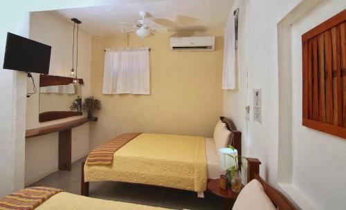 热带雨林天堂酒店 客房内的一张或多张床位