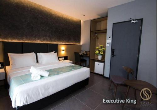 Solid Hotels客房内的一张或多张床位