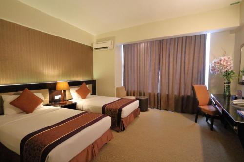 宾客Spa酒店客房内的一张或多张床位