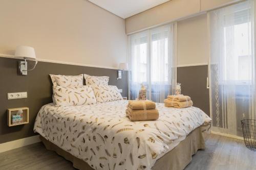 San Pietro Home La Rioja客房内的一张或多张床位