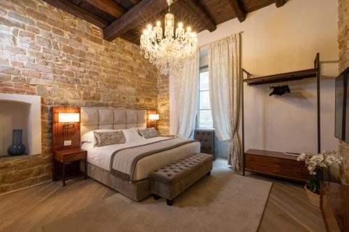 Donati Luxury Tower Suites客房内的一张或多张床位