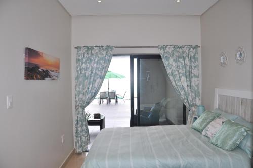 Azure Luxury Apartments Estate客房内的一张或多张床位