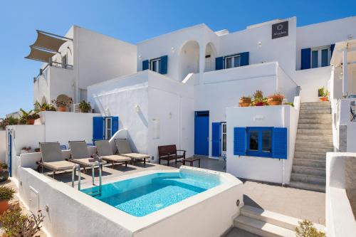 菲罗斯特法尼阿弗罗蒂特酒店的一座带游泳池和房子的别墅