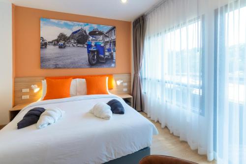 7 Days Premium Hotel Don Meaung Airport客房内的一张或多张床位